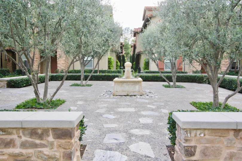 Stone and tree park on a grey day in Whispering Glen in the city of Irvine, California