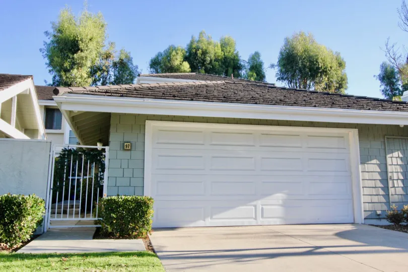 A closed carport of a bungalow in Willow Creek community.