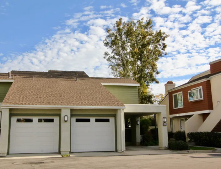 A multi-color two-storey townhouses in Windwood Townhomes community.