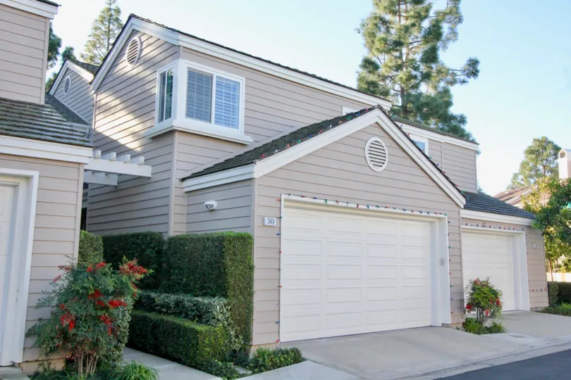 Elegant two-story beige gray home in Woodbridge Cove, Irvine CA