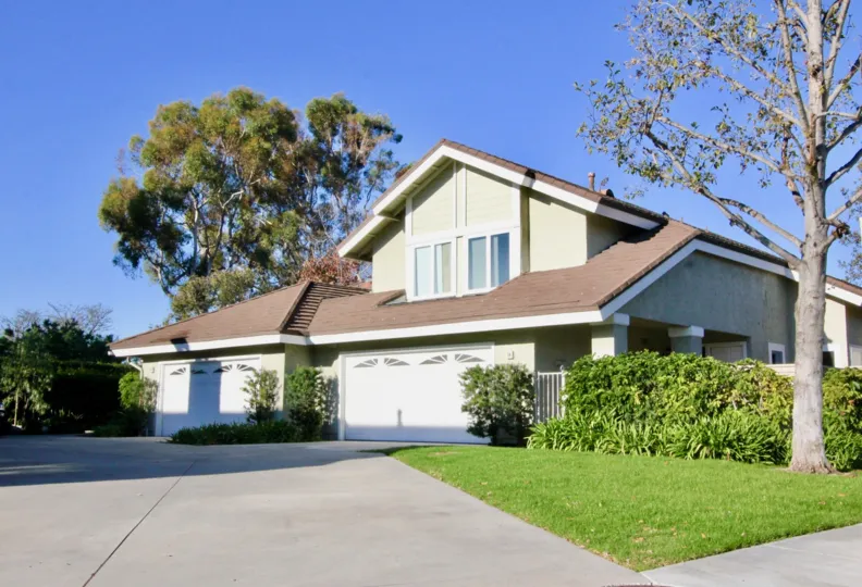 Multi-story home with multiple-car garage in Woodbridge Grove, Irvine, California