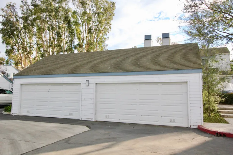 A two door white garage in Woodbridge Laurels of Irvine, California.