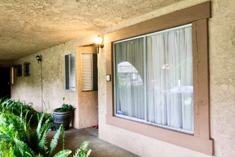 Inside the Villa in Cerro Del Rey has flower pots and light lamp with number plate 2