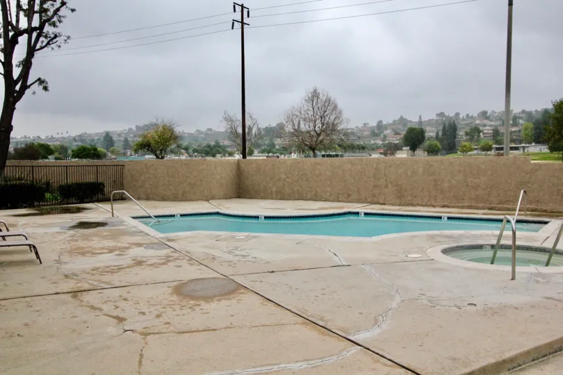 A SUNNY DAY IN THE COYOTE CREEK WITH THE SWIMMING POOL, PLANTS, TREES