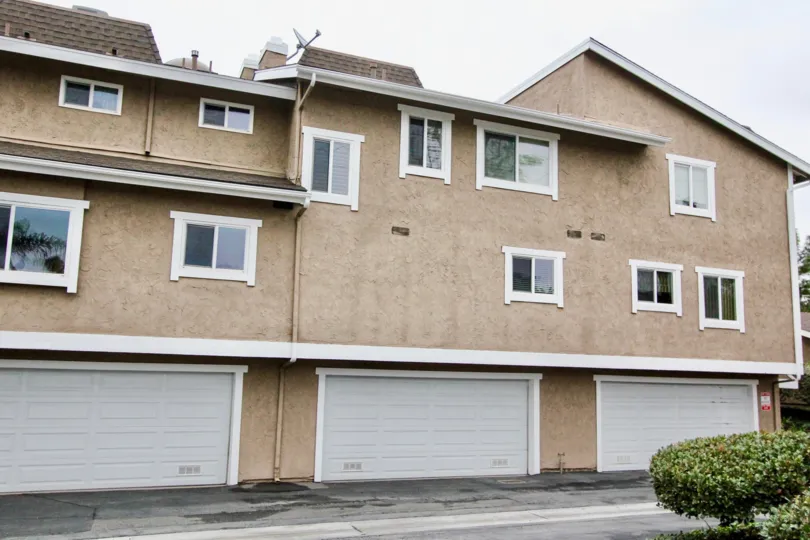 Villa in Coyote Creek has car parking facilities and dish antenna on terrace roff