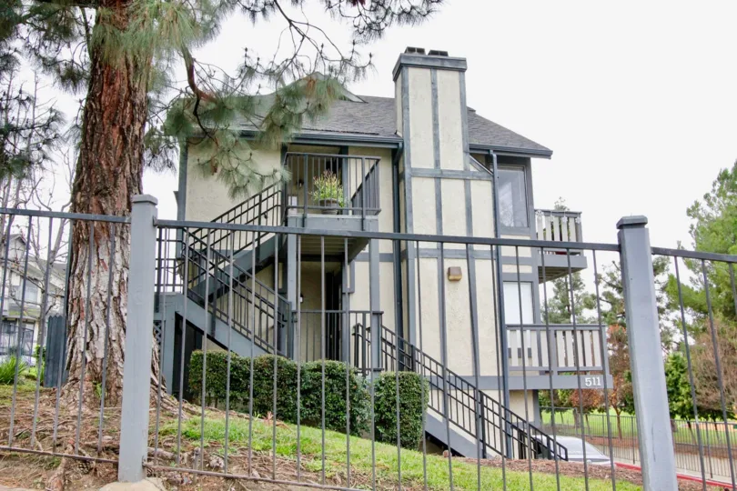 An independent two floor house in the Heritage Walnut with steps having iron grills and compound constructed with iron grills