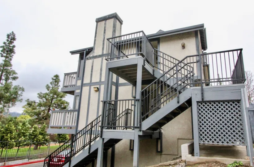 A staircase in the Heritage Walnut with ash color building.