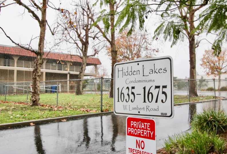 a rainy day in the Hidden Lakes with some trees and building