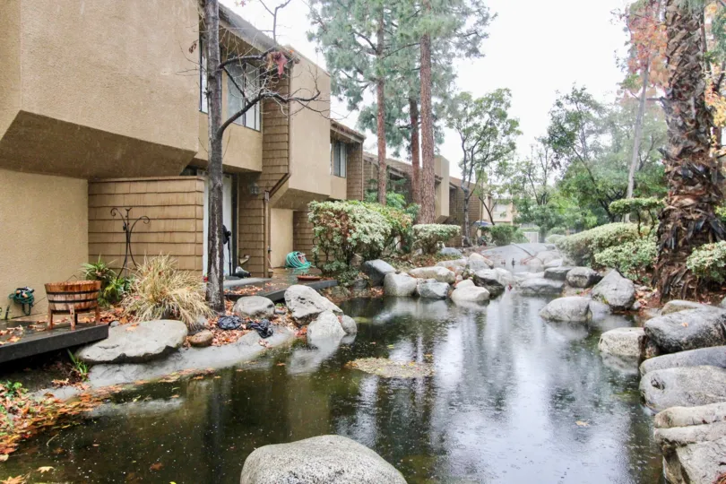 Awesome view of pond with near villas with trees of Hidden Lakes of La Habra