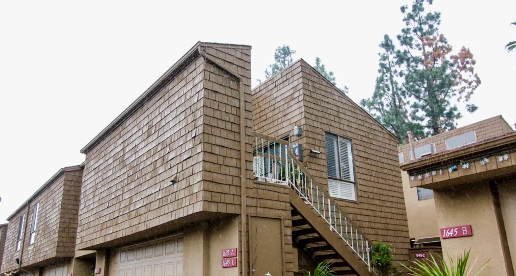 Brown colour villa having stair case and number in Hidden Lakes of La Habra
