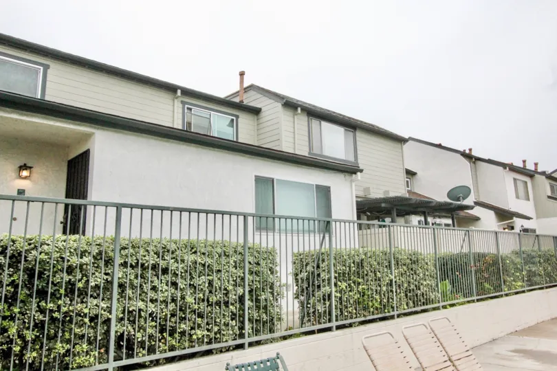 Beautiful villa with lamps glowing and dish antennas in Lakeview Townhomes of La Habra