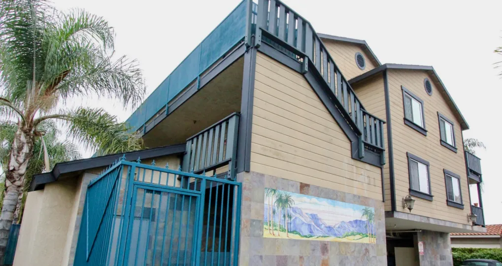 Art is painted at the wall of the Villa in Mountain View villas and with car is standing
