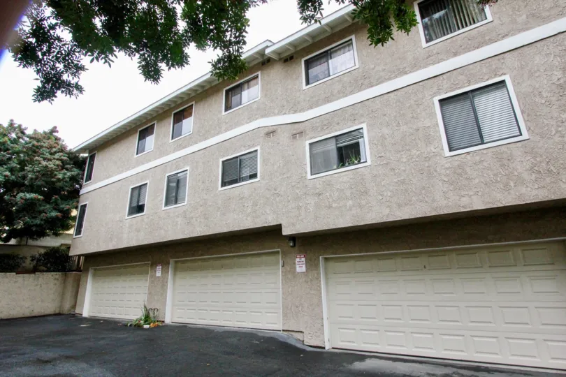 Apartment in Oliveview has car parking facilities with plants and trees
