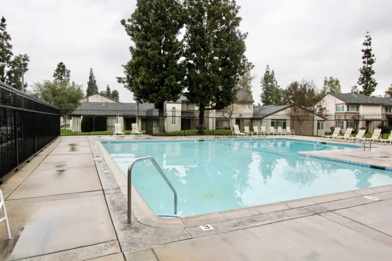 Nice Swimming pool wtih trees around and sitting place in Sunny Hills Village of La Habra