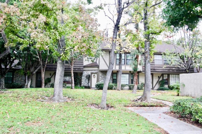 Fabulous view of trees with lawn near a villa in The Gables of La Habra