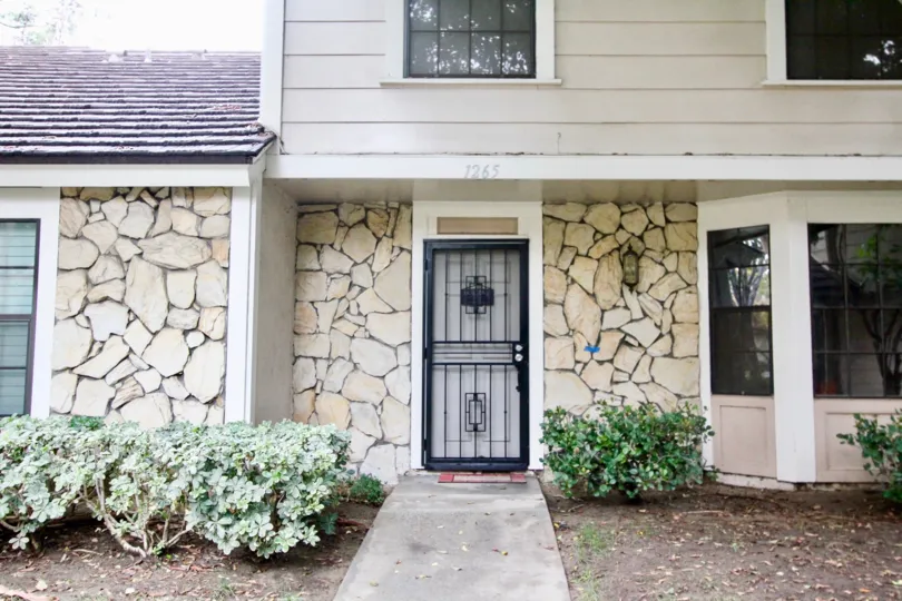 a building in the gables with a house that has numbered as 1265 and also has steel door in the entrance