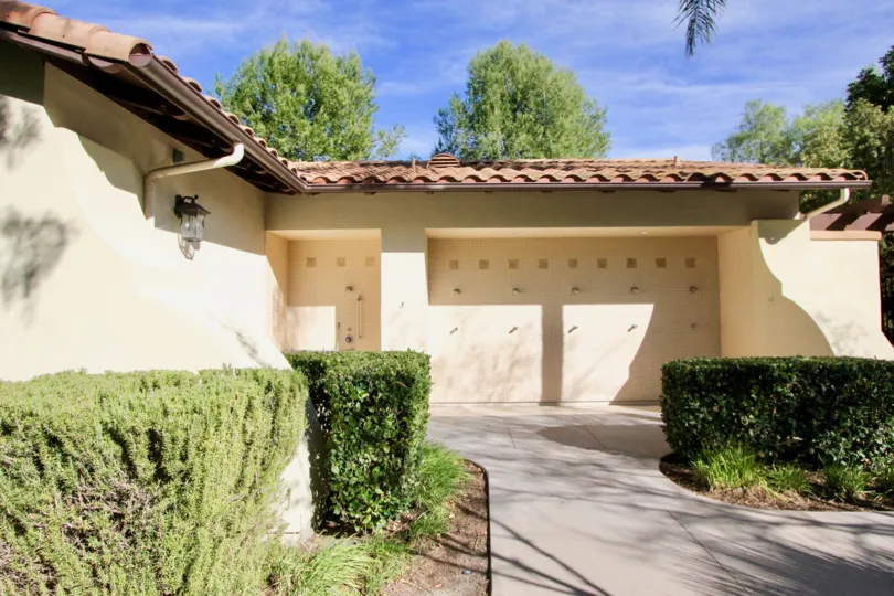 A stucco home in the Castellina neighborhood on a sunny day