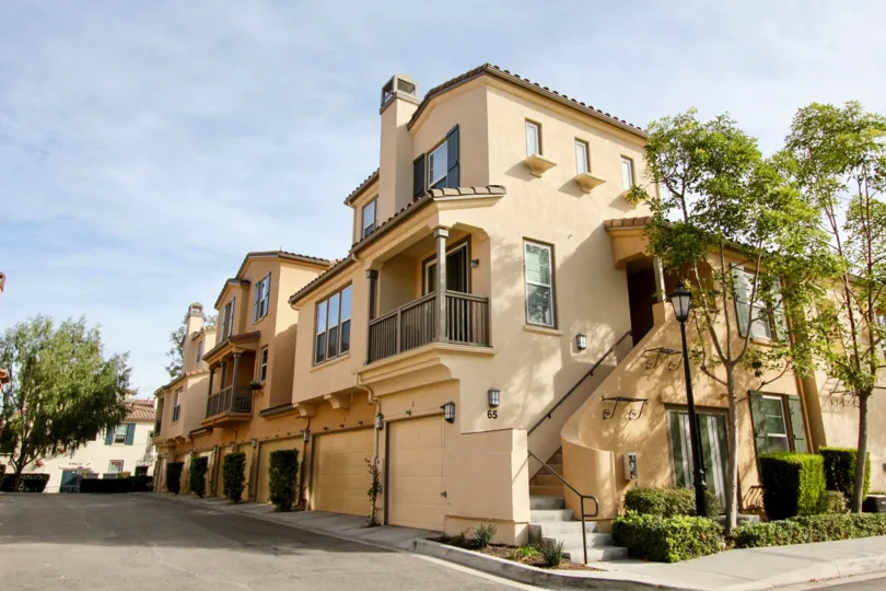 Outside view of a stairwell and front entrances of condos in Sansovino, Ladera Ranch, California