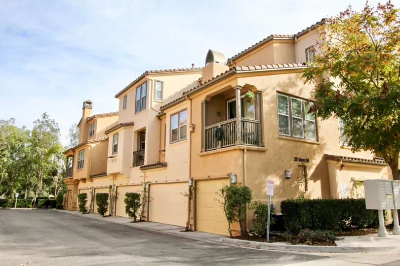 Several beautiful tan homes in the Sansovino community in Ladera Ranch, California.