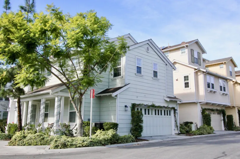 Nice road side view of villas with trees in Sutters Mill of Ladera Ranch