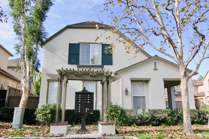 Villa with trees and entrance view of Sycamore Grove of Ladera Ranch