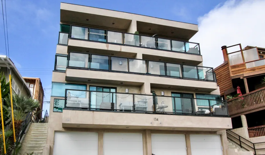 THE 174 BUILDING IN THE 174 CLIFF DRIVE WITH THE BALCONIS, STEPS, SHOPS