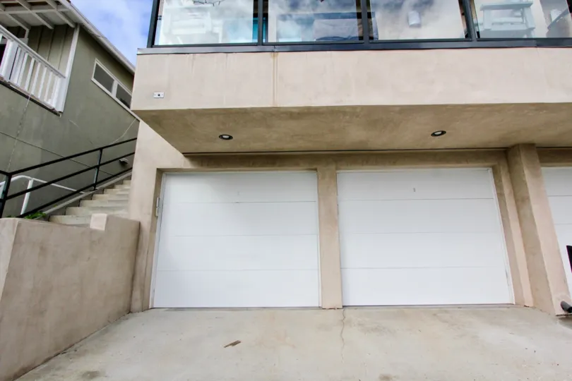 Garage Doors and stairs at 174 Cliff Drive in Laguna Beach, CA.