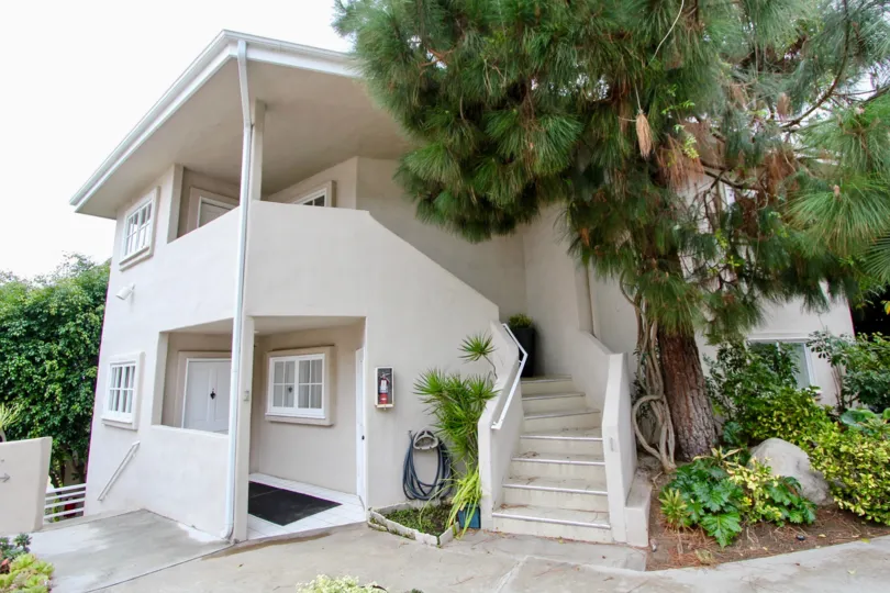 A cozy spiral stairway leading up to the second story of Creekside in Laguna Beach CA