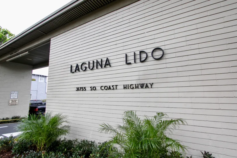 a warm day in the laguna lido with building that has in name of laguna lido no of 31755 coast highway
