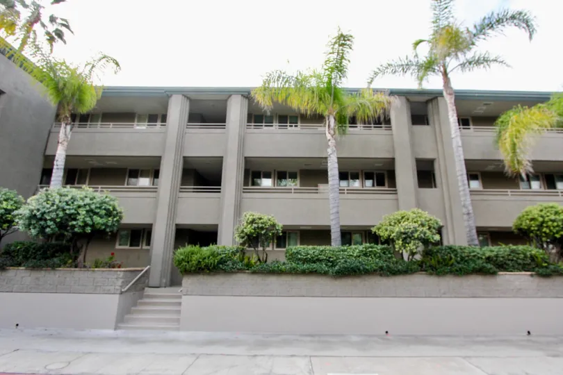 Frontal building view of Laguna Sands captured on a clear day in Laguna Beach, CA