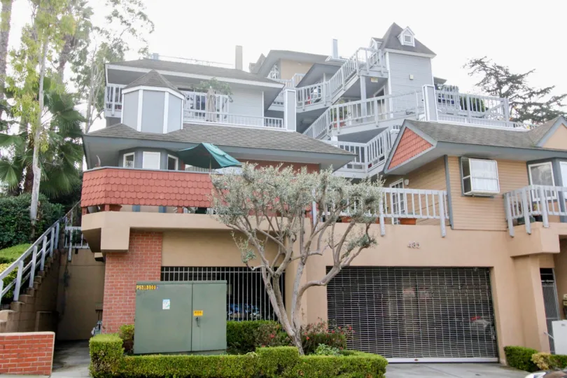 View of building and gated parking available Mermaid Terrace in Laguna Beach, CA