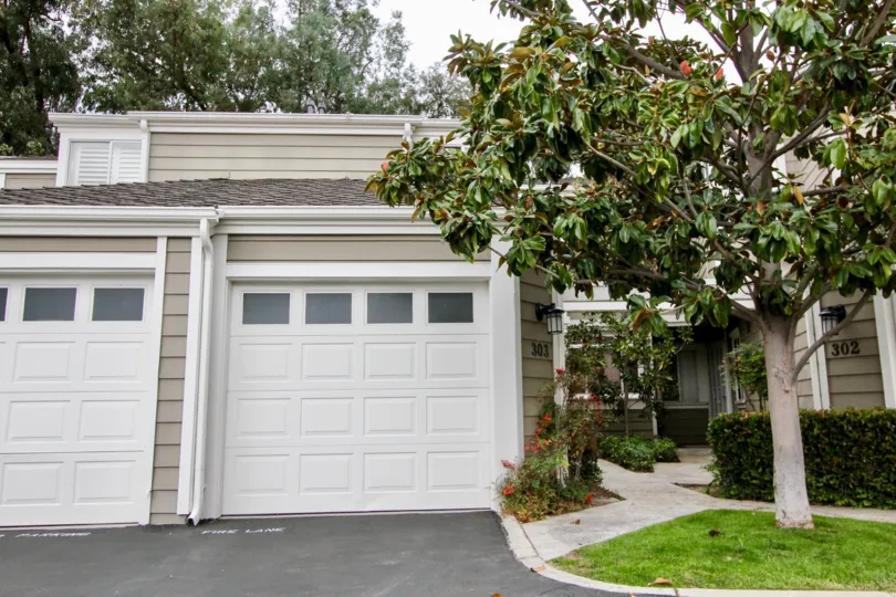 A great day in the Terraces at Canyon Hills with a house and tree.
