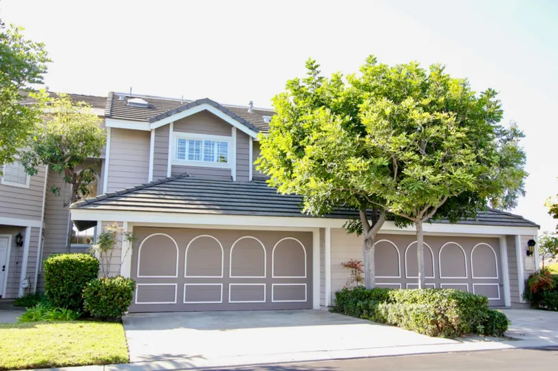 White decoration sits on front of tan garage doors at the Beacon Hill Vistas
