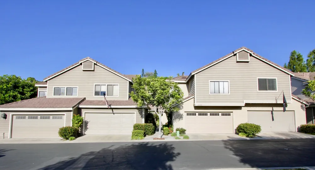 A view of driveways and garages of Camden Court homes in Laguna Niguel, California