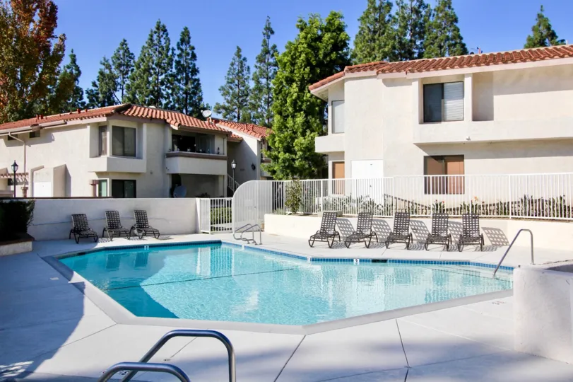 THE ESTATE IN THE CASA LA PAZ WITH THE SWIMMING POOL, DISH ANTENNA, CHAIRS