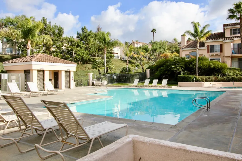 THE BUNGALOW IN THE COSTA BRAVA WITH THE SWIMMING POOL, CHAIRS, PLANTS, TREES
