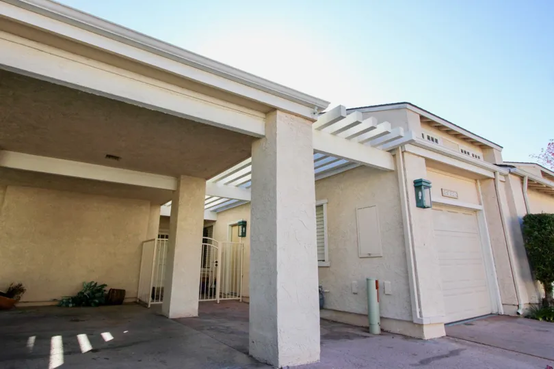 View of covered parking and one car garage at El Niguel Terrace in Laguna Niguel, California