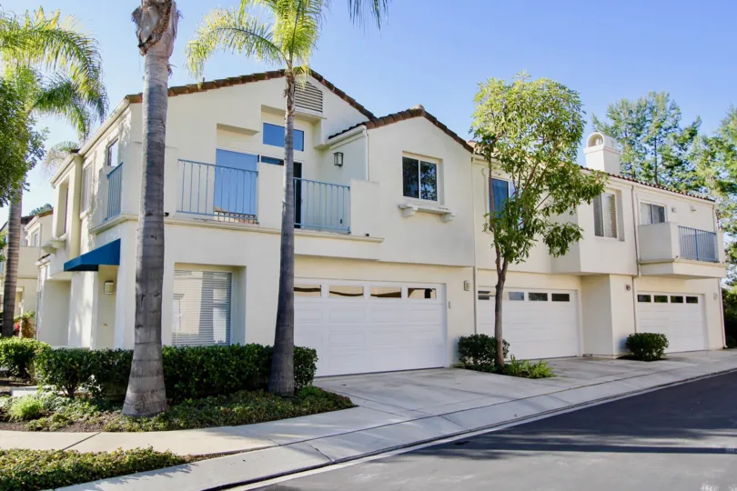 Four privacy windows sit on a garage door in the Encore Community