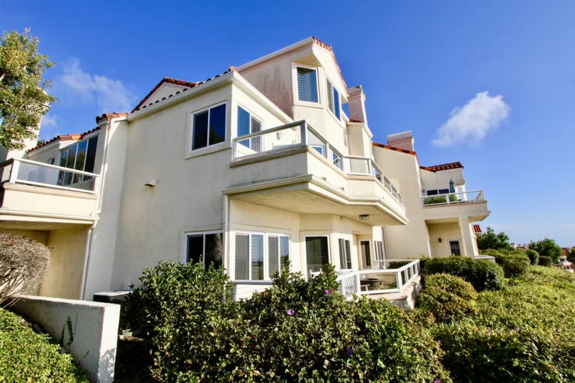 Hedges and blue sky above Laguna Sur in Laguna Niguel, CA