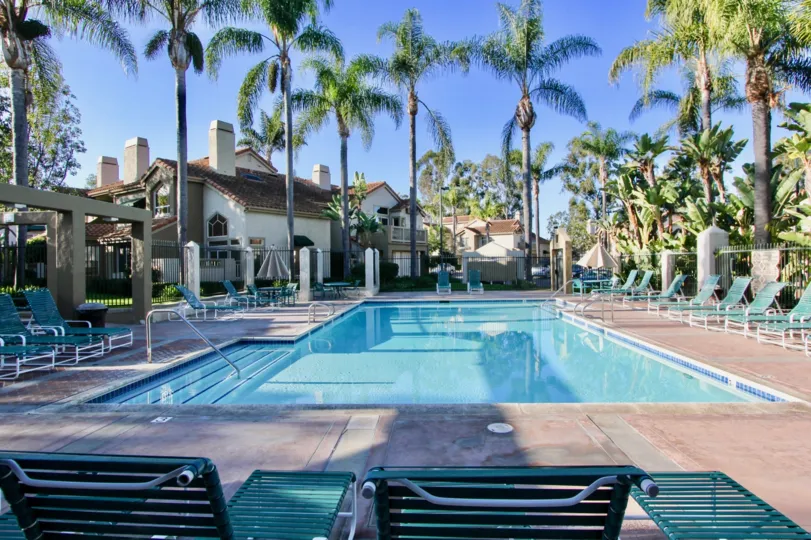 Very nice swimming pool with palm trees and sitting in Palm Court of Laguna Niguel