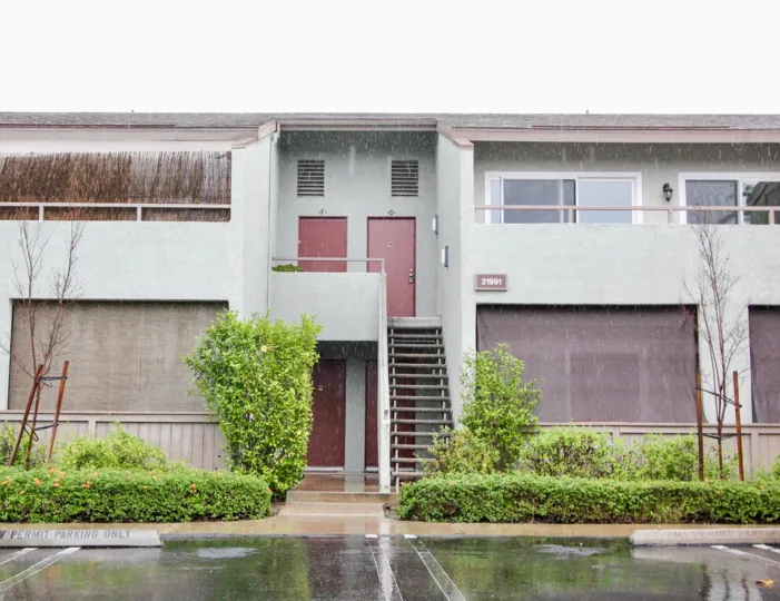 Sidewalk and apartments in Bench Mark Villas in Lake Forest, CA