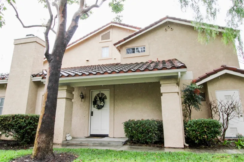 Front door and lawn at Canyon rim in Lake Forest, CA