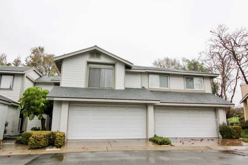 Two story duplex homes in the Grandview Crest community on a rainy day