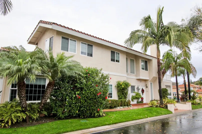 A stately two story stucco home in the Lake Forest Keys community of Lake Forest, California