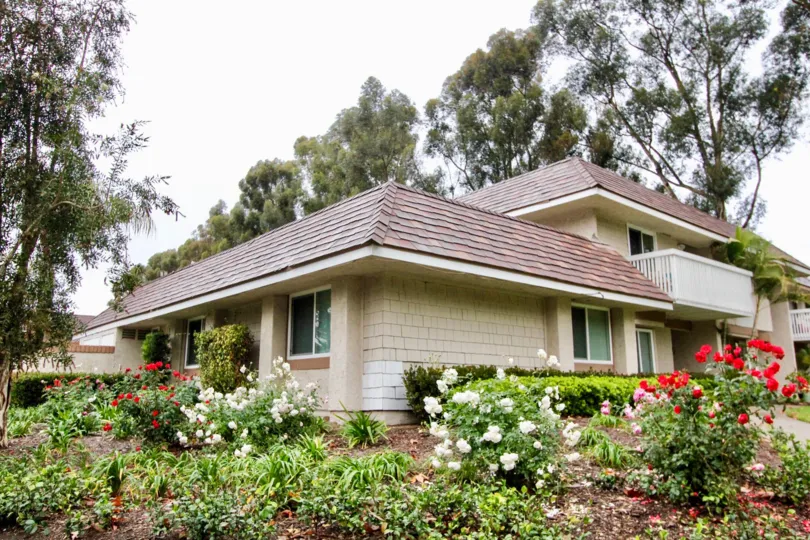 A Lake Forest house surrounded by flowers in bloom in Lakeside Park California.