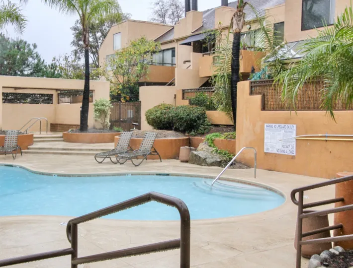 Pool and trees at the Le Parc in Lake Forest, CA