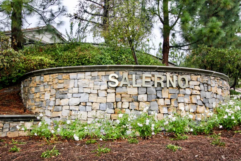 A stone welcome sign at the Salerno in Lake Forest, CA
