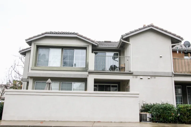 A grey two story building in Salerno community in Lake Forest, California.