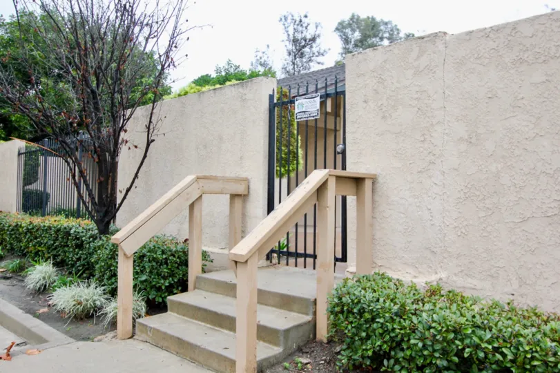 Excellent entrance gate with grill and steps in Serrano Creek Villas of Lake Forest