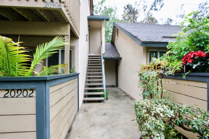Out side wooden steps to the huge building in Serrano Creek Villas.